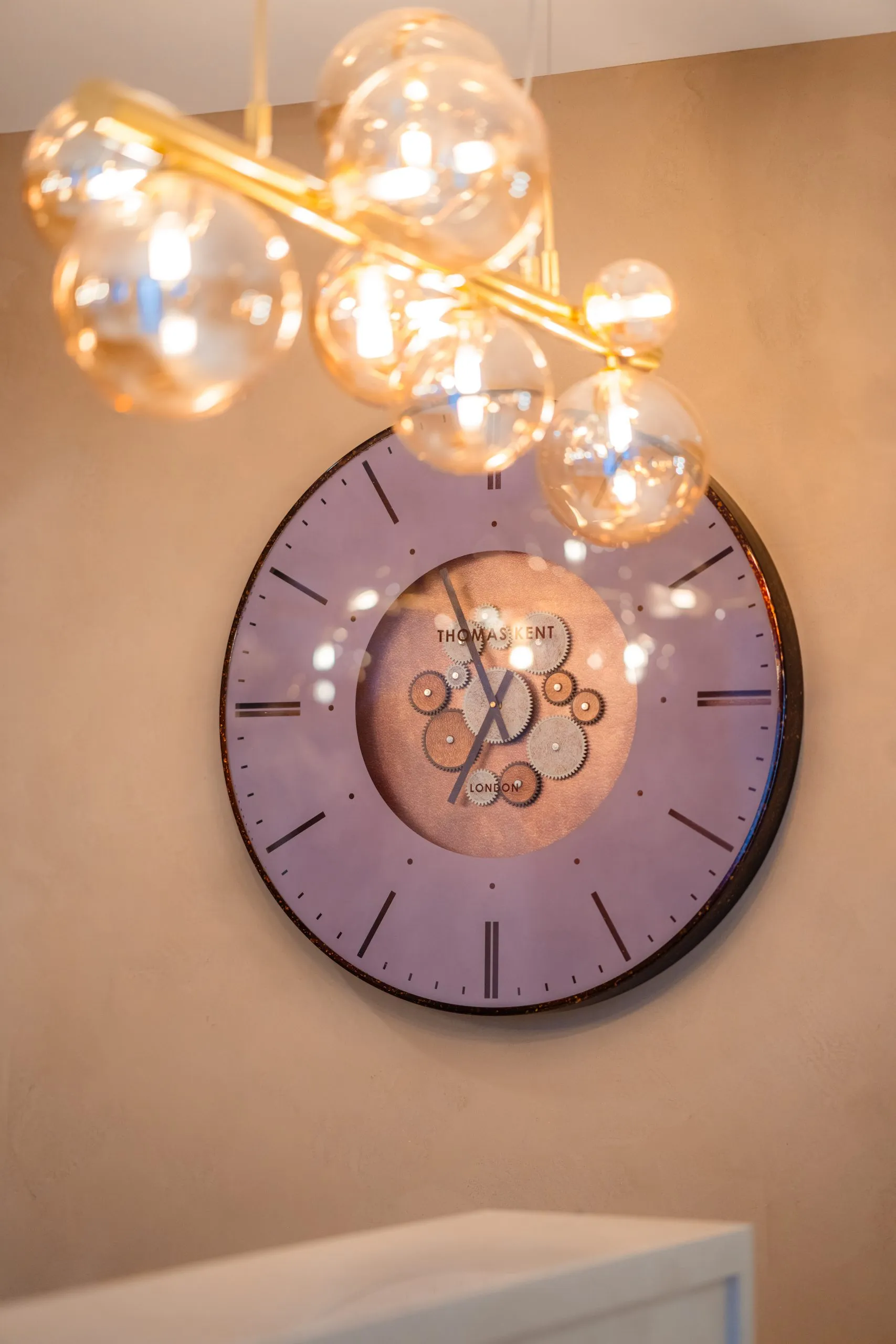 Statement wall clock and pendant lighting at Bromsgrove Dental Specialists