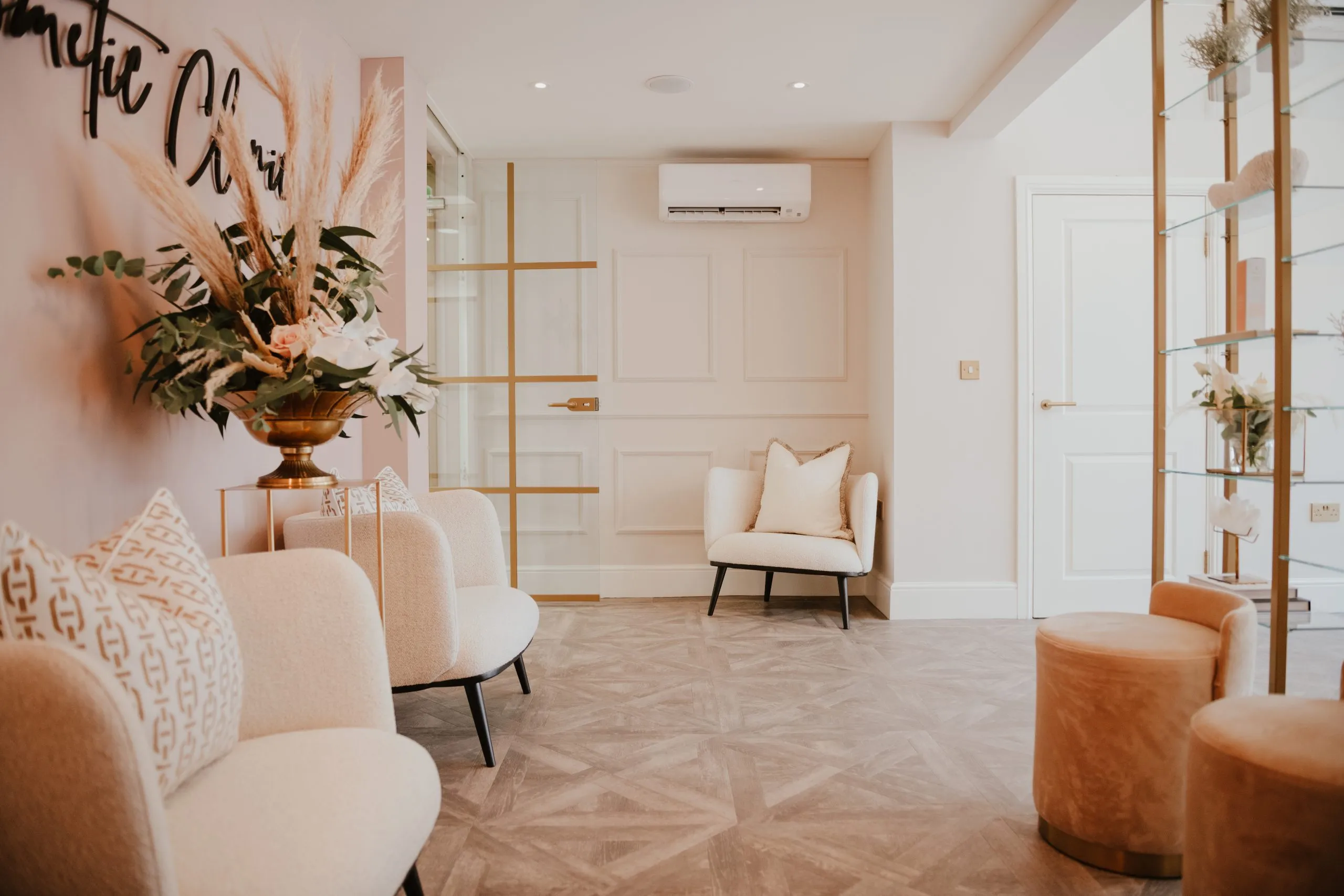 Finished waiting area with velvet seating at Blossom Cosmetic Clinic, York — delivered by BH Projects Group